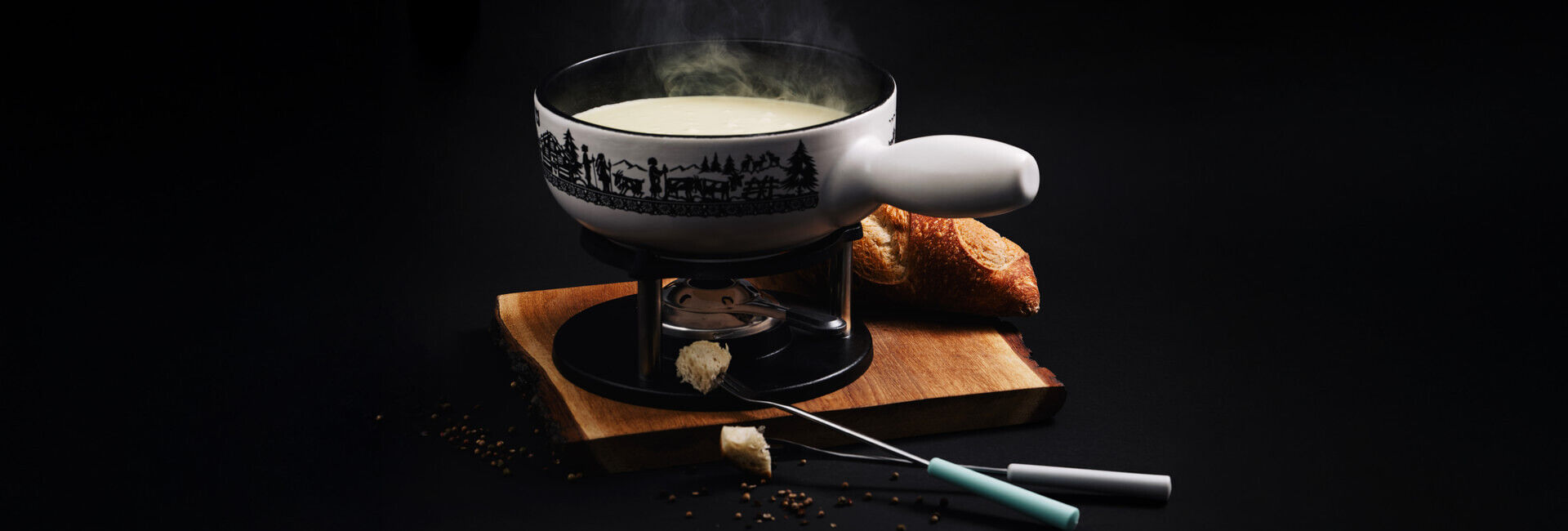 Das Käsefondue: Schweizer Tradition zum Dahinschmelzen